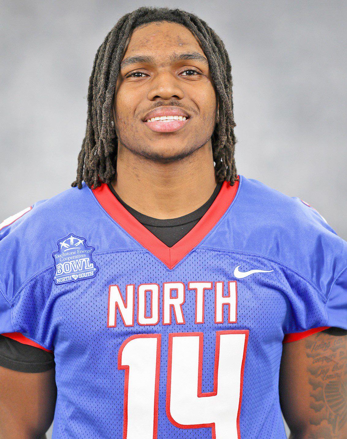 Touchstone Energy Bowl player give back to kids